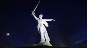 A statue of a person holding a sword Description automatically generated with medium confidence